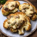 Cauliflower Steaks with Mushroom Thyme Filling and Parmesan